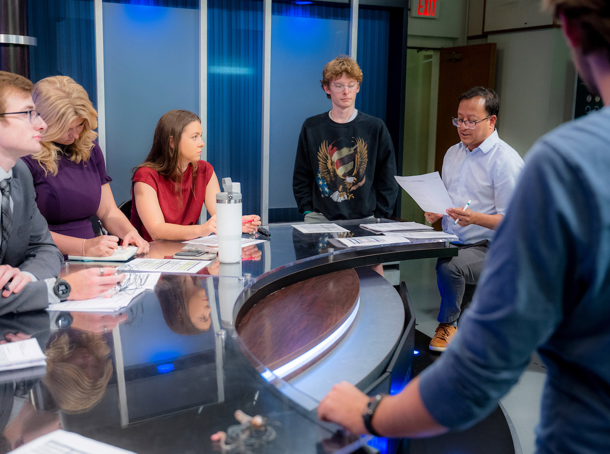 Atish Baidya and OHIO students at the WOUB studio