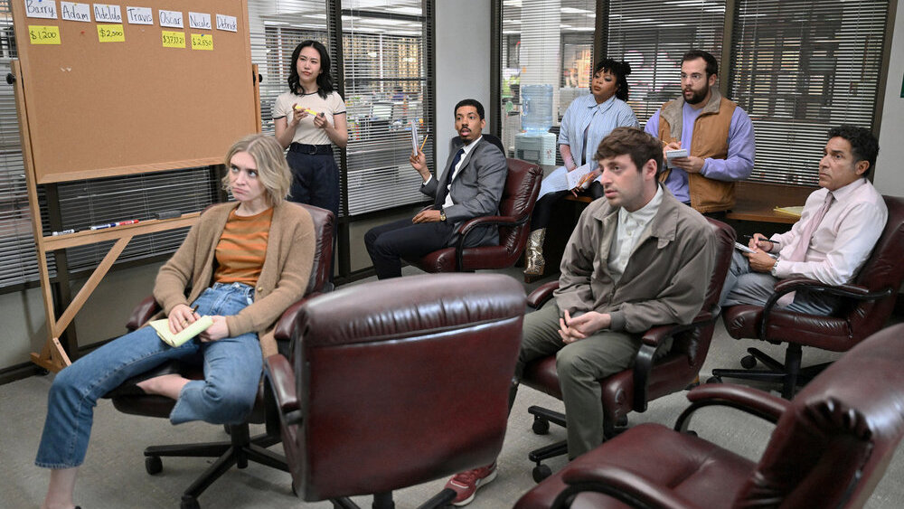 Bored people sitting in an office.