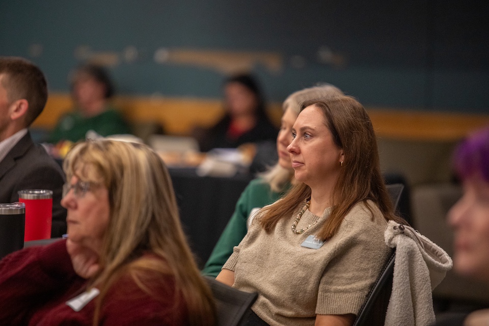 People listening to a presentation