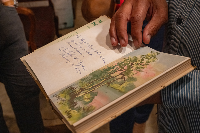 David Butcher with an artifact from the Tablertown People of Color museum