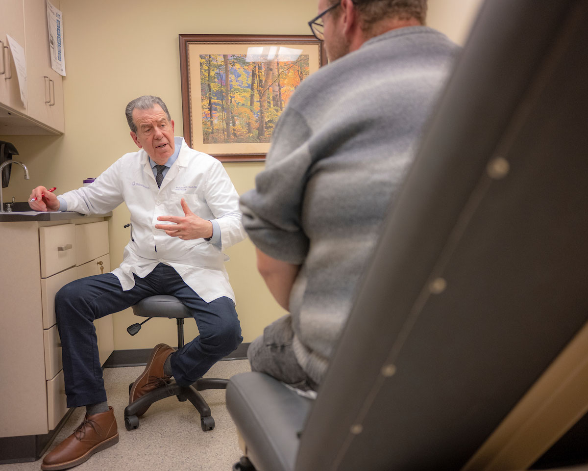 An image of a physician speaking with a patient.