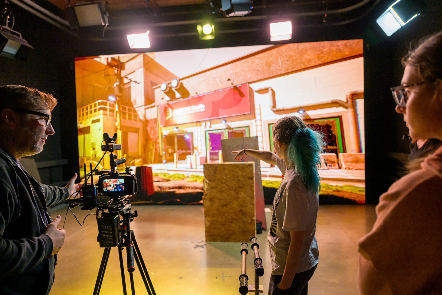 Media Arts and Studies Associate Professor Brian Plow and Media Arts Production students work the LED Wall.