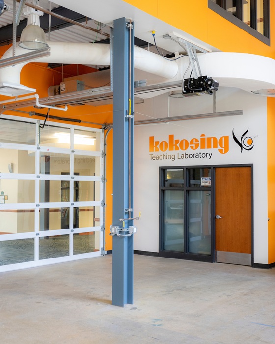 The Kokosing Teaching Laboratory. The room shown has a window to another room and on the wall are the words "Kokosing Teaching Laboratory"