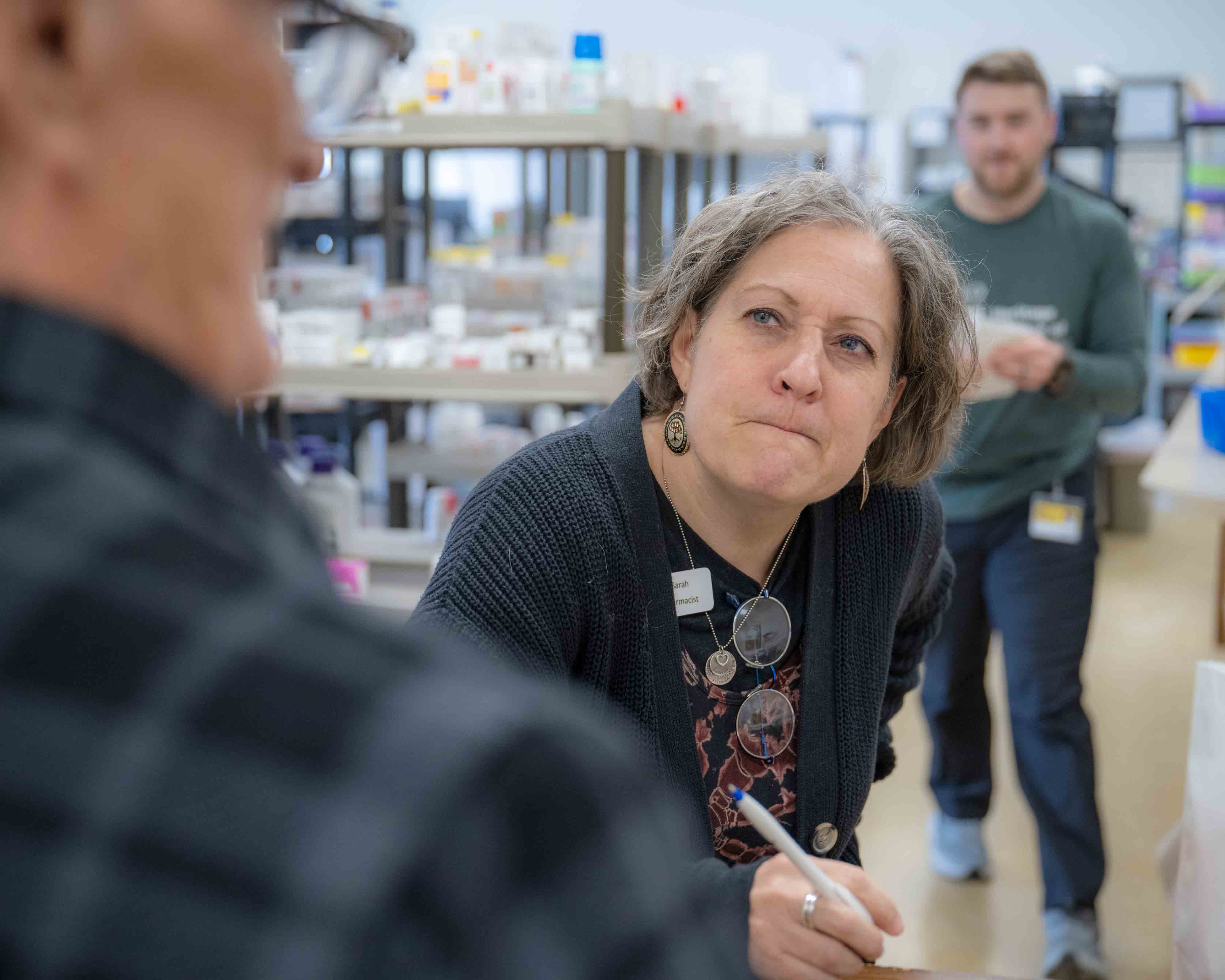 Sarah Adkins listens to a client
