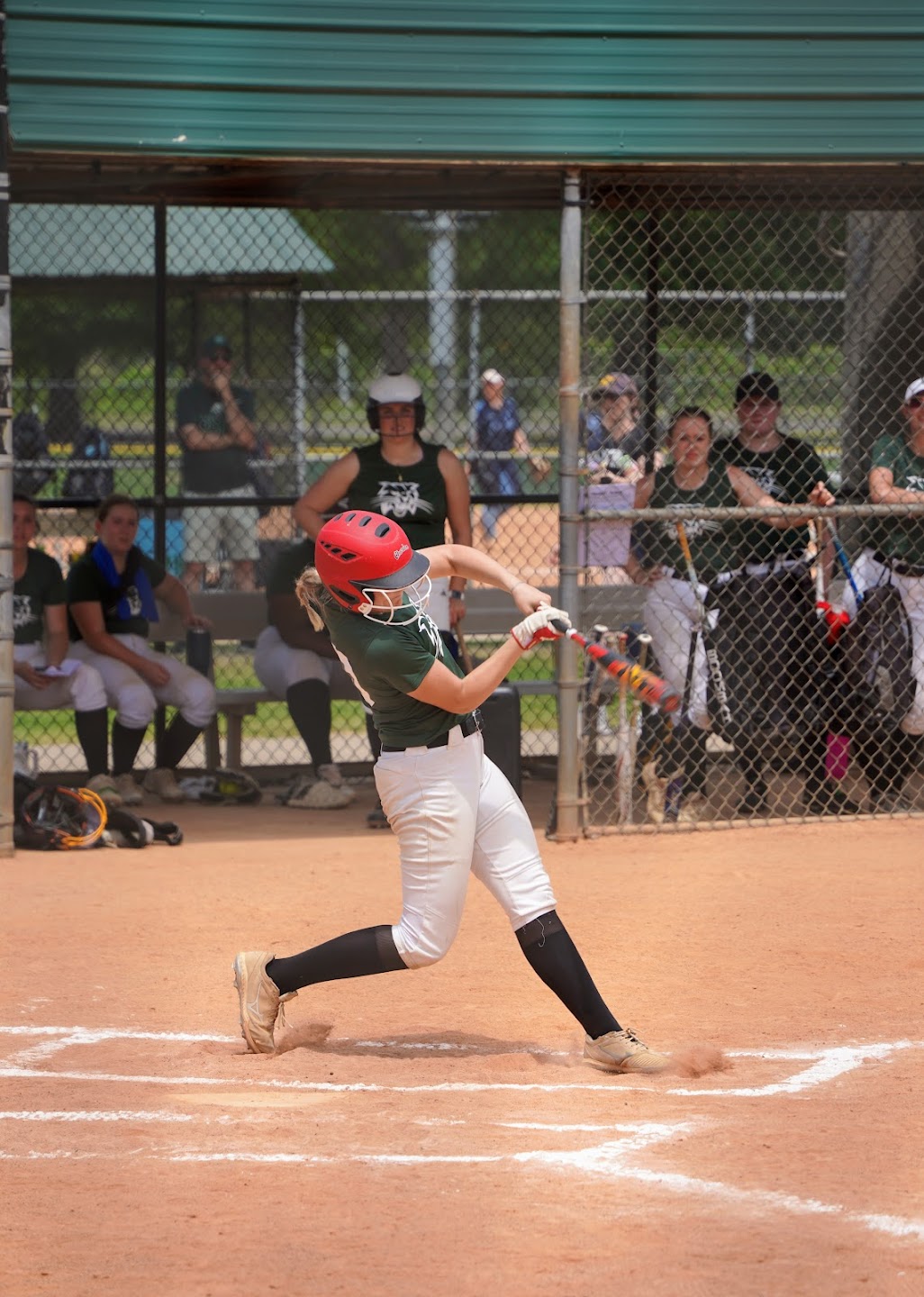 Player hitting a softball