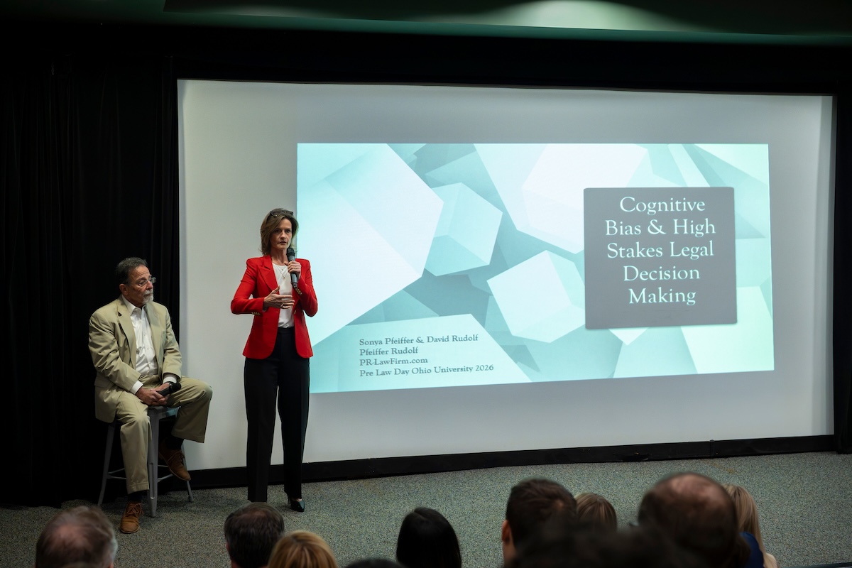 Sonya Peiffer and David Rudolph in the Athena Cinema giving a presentation  for Pre-Law day
