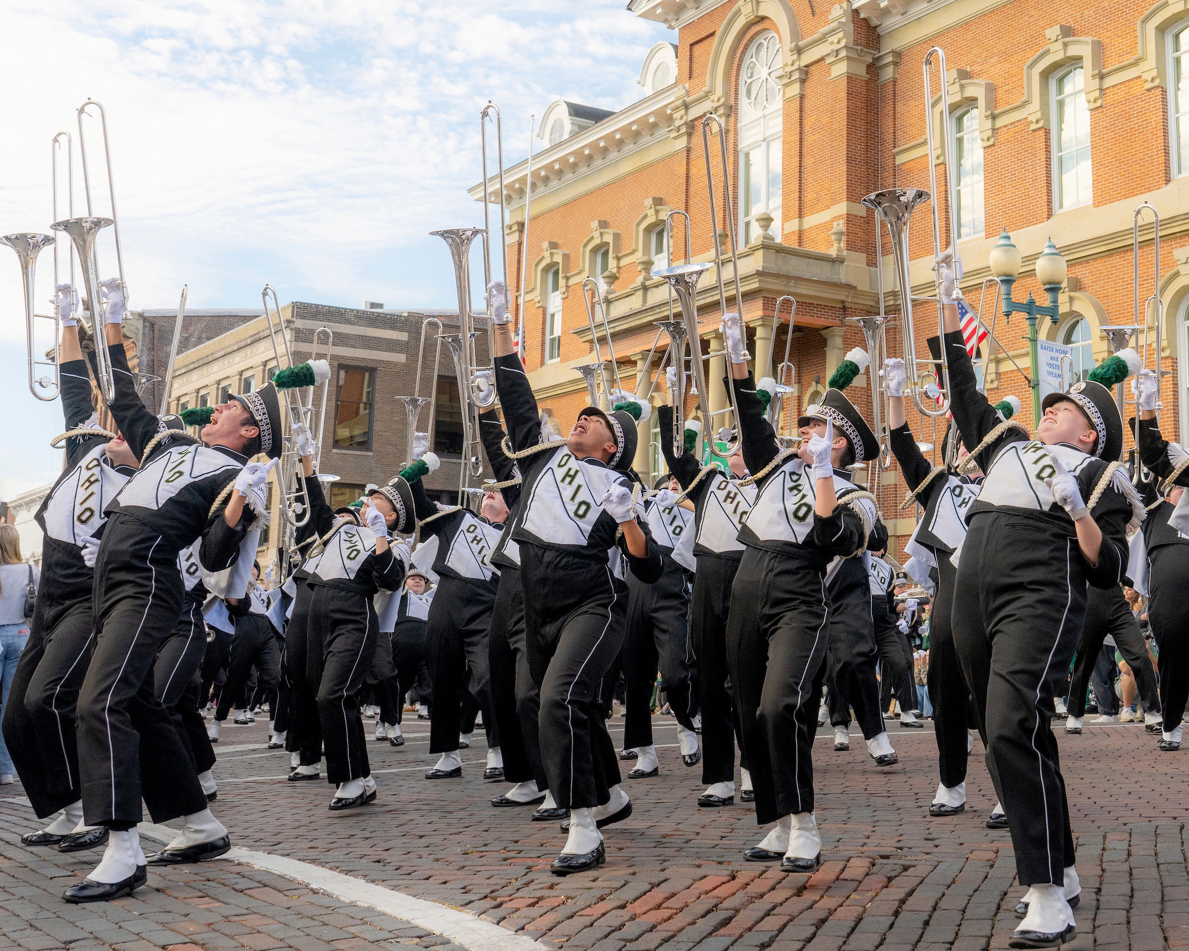 The Marching 110 performs during OHIO's Homecoming Parade.