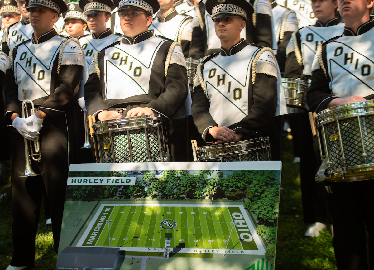 The Marching 110 celebrates news of its new practice facility. 