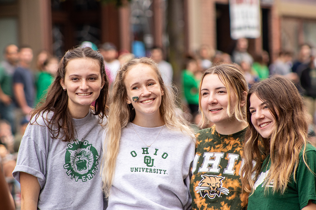 Ohio University Bobcats show their pride with OHIO gear during Homecoming festivities.