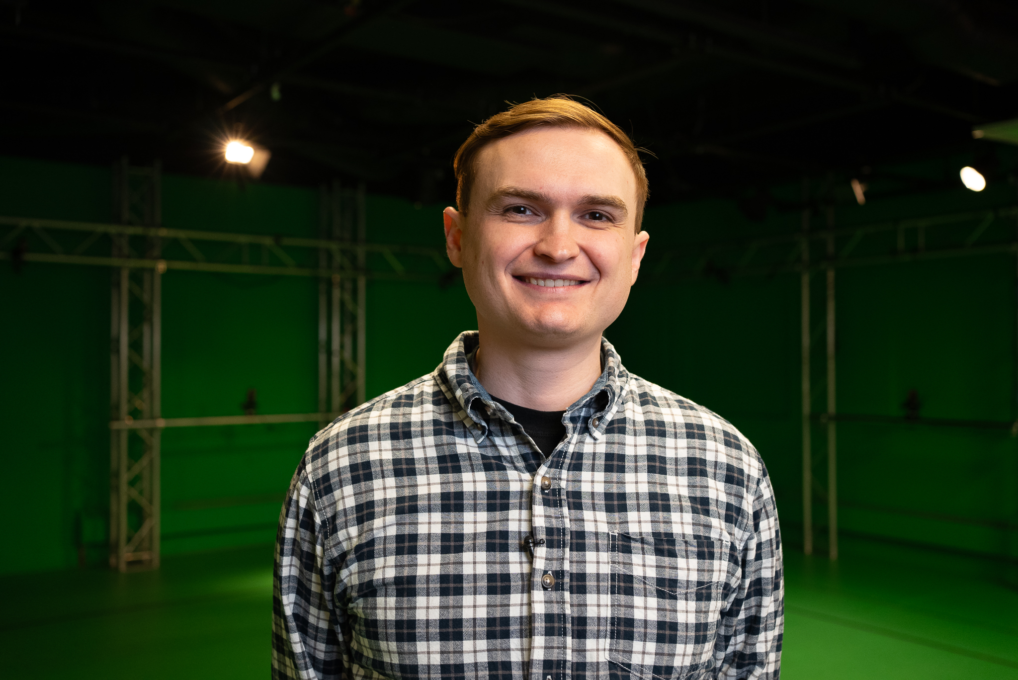 Jordan Herron stands in the Ohio University GRID Lab