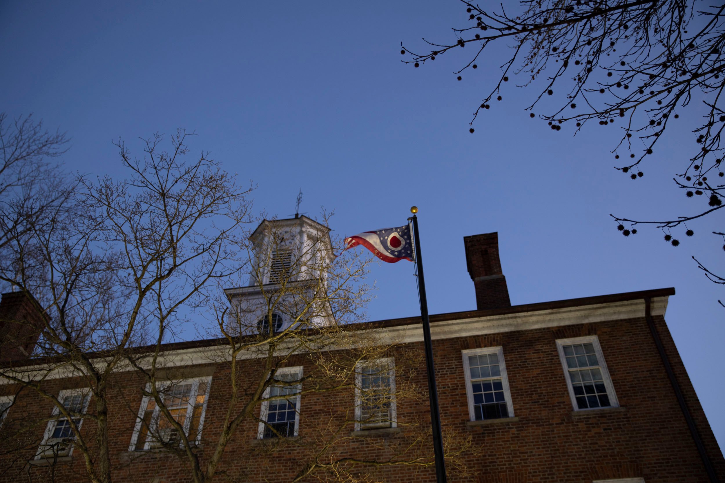 Ohio state flag flies in College Green on OHIO's campus.