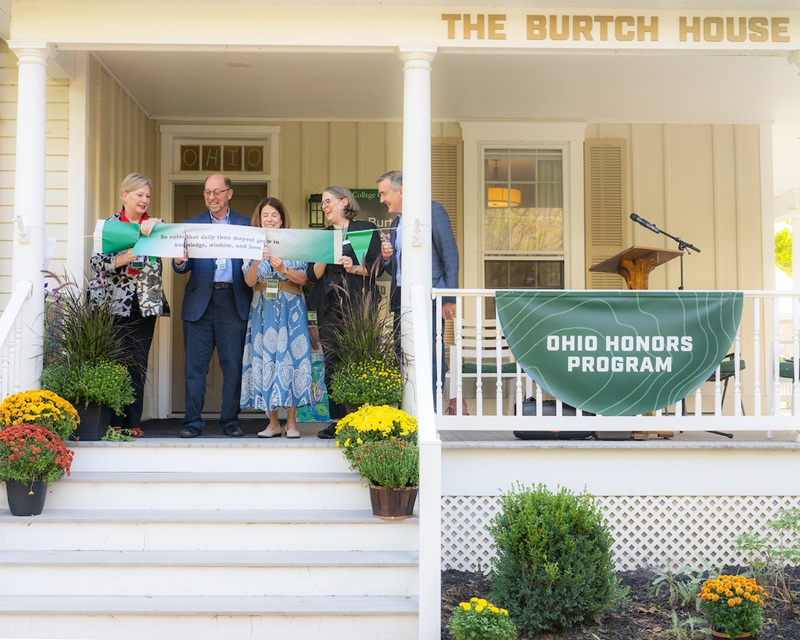 OHIO representatives and Bruce and Janie Burtch cut the ribbon on the porch of The Burtch House