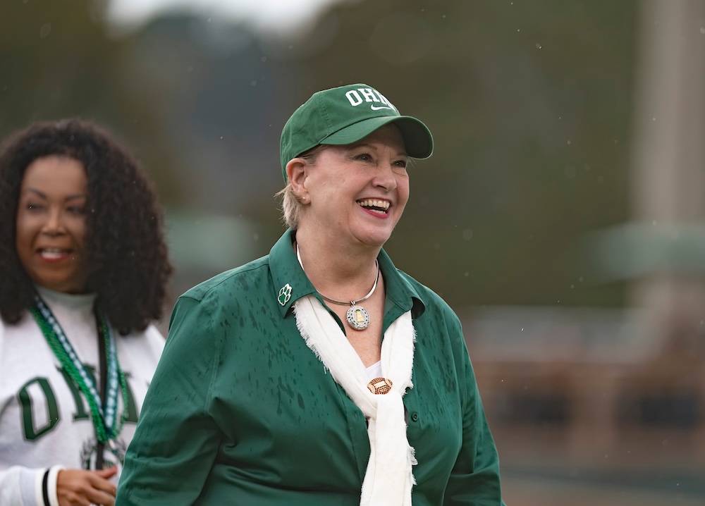 President Gonzalez attends the raining 2026 Homecoming football game 