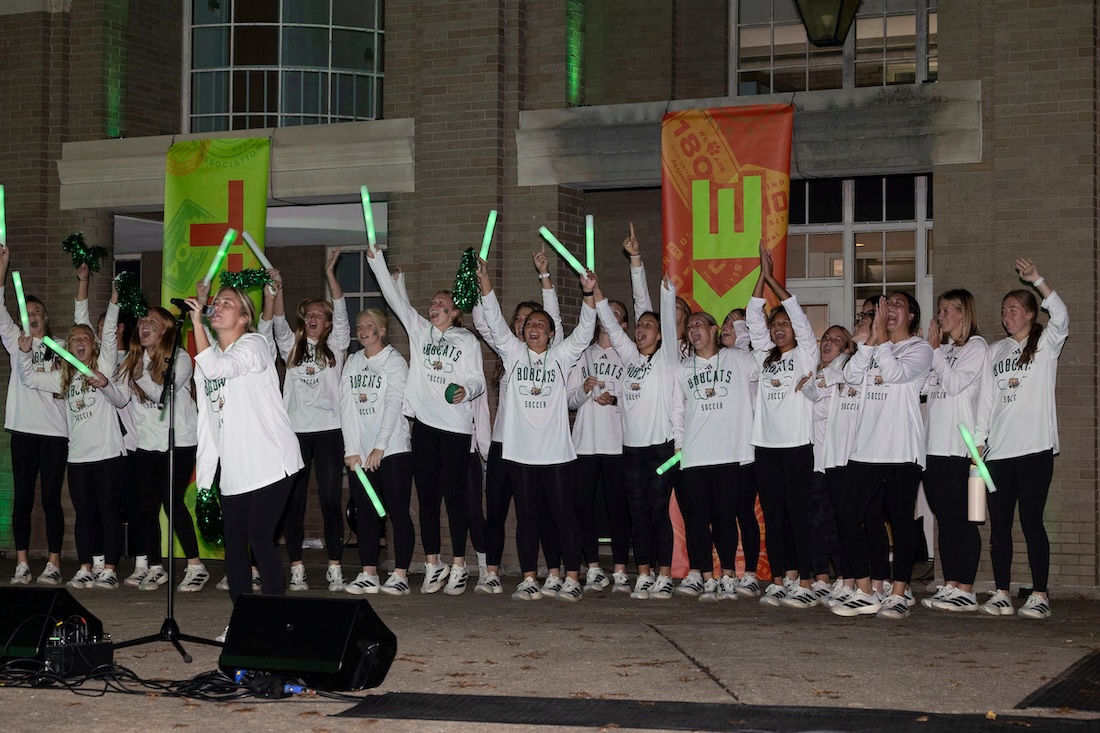 An OHIO team rallies the crowd at the Yell Like Hell rally