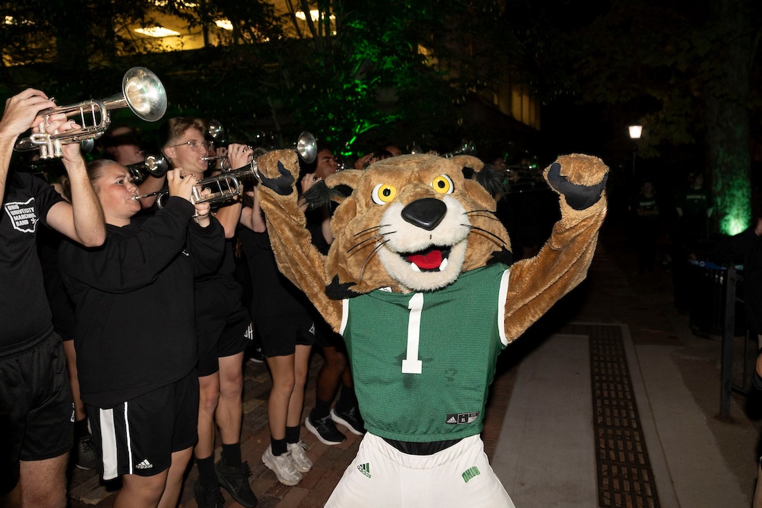 Rufus the Bobcat raises his hands at the Yell Like Hell rally, Homecoming 2026