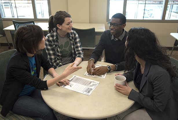 (From left) Erika Peyton, assistant director for employer relations and marketing at the CLDC, works with students Anna Seethaler, Demari Muff and Gracie Freireich during drop-in coaching services.