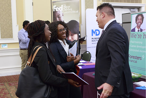 Ohio University students speak with a recruiter at the CLDC’s biannual Career and Internship Fair.