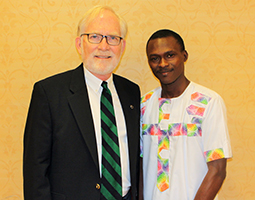 Alumnus David Crane poses with student Abubakarr Sidik Sesay at the Global Professional Development Series event held in October.