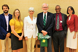 Pictured are Global Leadership Center Director Matthew LeRiche, alumna Bethany George, Vice Provost for Global Affairs and International Studies Lorna Jean Edmonds, alumnus David Crane, African Studies Director Ghirmai Negash and alumna Judi Crane.