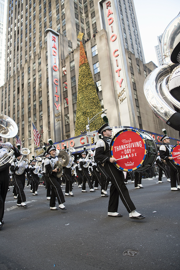 The Marching 110 parade past Radio City Music Hall 