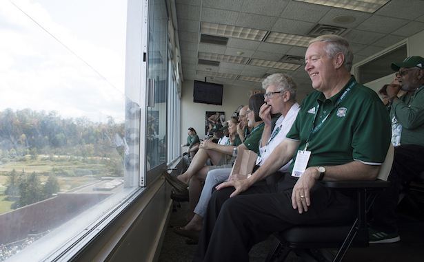 President and First lady Nellis in the President's Box for the Homecoming game. 