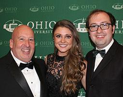 Ohio University Eastern faculty member Michael Schor shares a few laughs with alumni Jennifer Fox and Jason Garczyk at the 60th Anniversary Gala.
