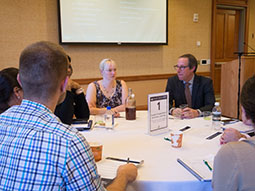 Brad Cohen helps facilitate conversation at a table during the 2017 Ideation Event.