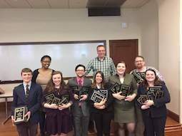 Members of the speech and debate team, Speaking Bobcats, celebrate their success in the 2015-2016 tournament year.