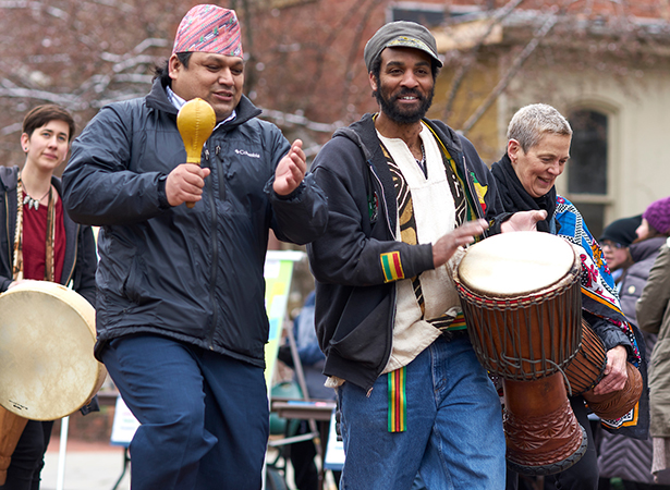 Percussionists add a distinct sound to the International Street Fair’s annual parade of flags.