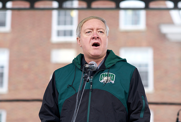 Ohio University President M. Duane Nellis welcomes everyone to his first International Street Fair, addressing the crowd from a stage at OHIO’s Howard Park.