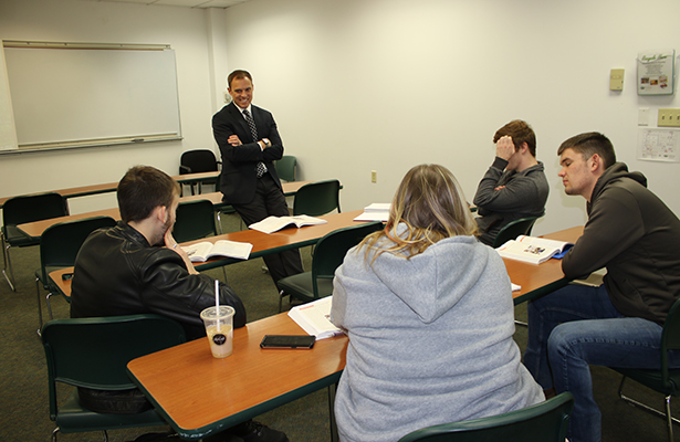 City of Chillicothe Mayor, Luke Feeney, consults with his POLS 1500 students during group discussion