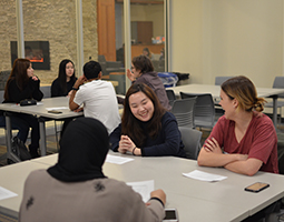 Ohio University students share a laugh during a recent International Conversation Hour discussion.
