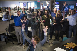 Cincinnati Enquirer staff celebrates after winning the Pulitzer Prize for local reporting