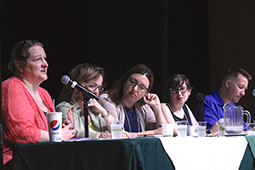 OHIO faculty participate in a panel discussion during the opening session of the conference.
