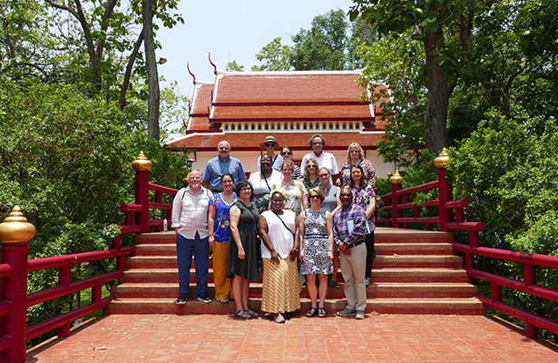019 Global Connections group in front of Chiang Mai University's ancient ceremonial degree awarding hall