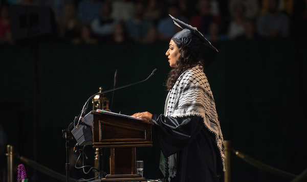 Amal Afyouni delivers the student address at undergraduate commencement.
