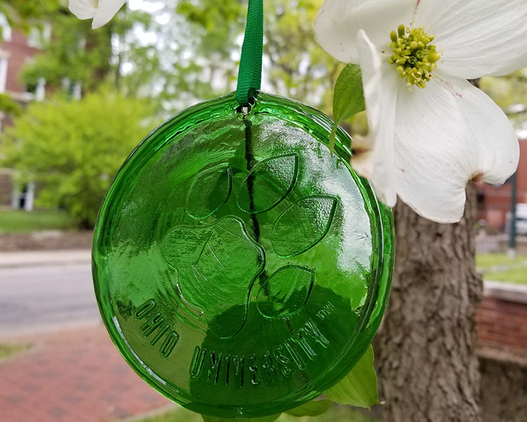 Pictured is an Ohio University paw sun catcher.