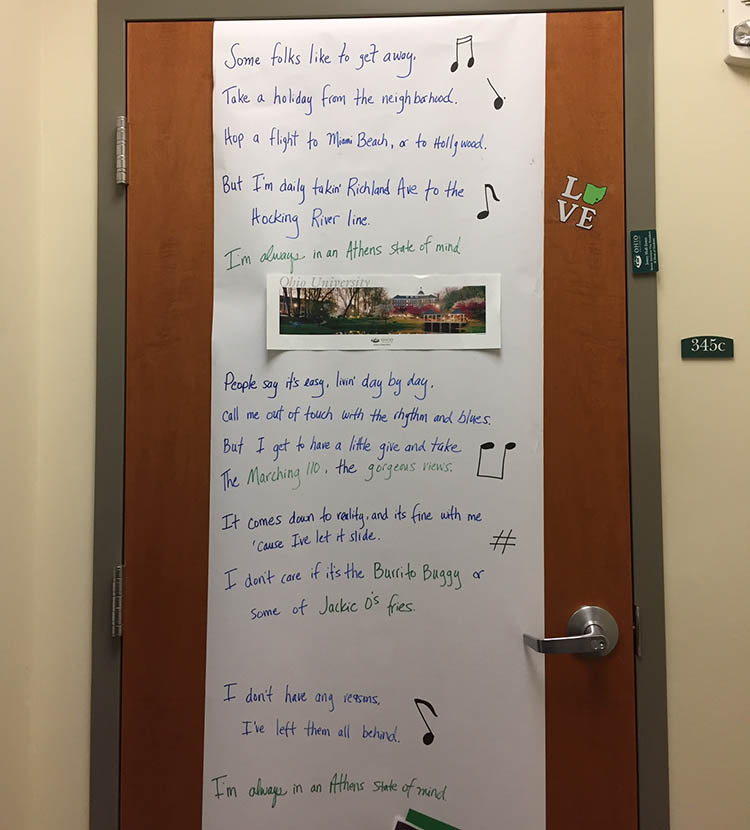 As part of the Paint the Town Green decorations in the Dean of Students office, the door of Senior Associate Vice President of Student Affairs and Dean of Students Jenny Hall-Jones’ office features song lyrics proudly boasting, “I’m always in an Athens State of Mind.”