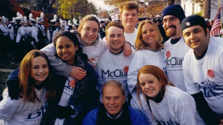 David C. and Joan Herrold Wood Cutler Scholar Toby Fallsgraff (center), BSJ ’04, is seen with fellow Ohio University students and former Ohio Gov. Ted Strickland at an OHIO Homecoming. 