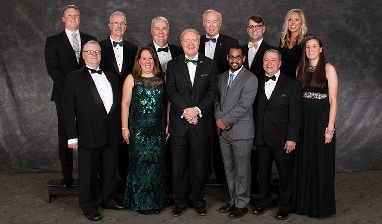 Ohio University President M. Duane Nellis (front center) is pictured with (front, from left) Mark D. West, Jennifer Jones Donatelli, Keith Hawkins, William “Erv” Ball and Tiffany Horvath, and (back row, from left) Marc Krauss, Ronald Burns, Peter Thompson, Luke Frazier and Melissa Griffin.