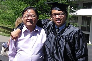Alex Sheen, founder of “Because I Said I Would,” is pictured with his father at Ohio University’s 2008 Commencement ceremony. 