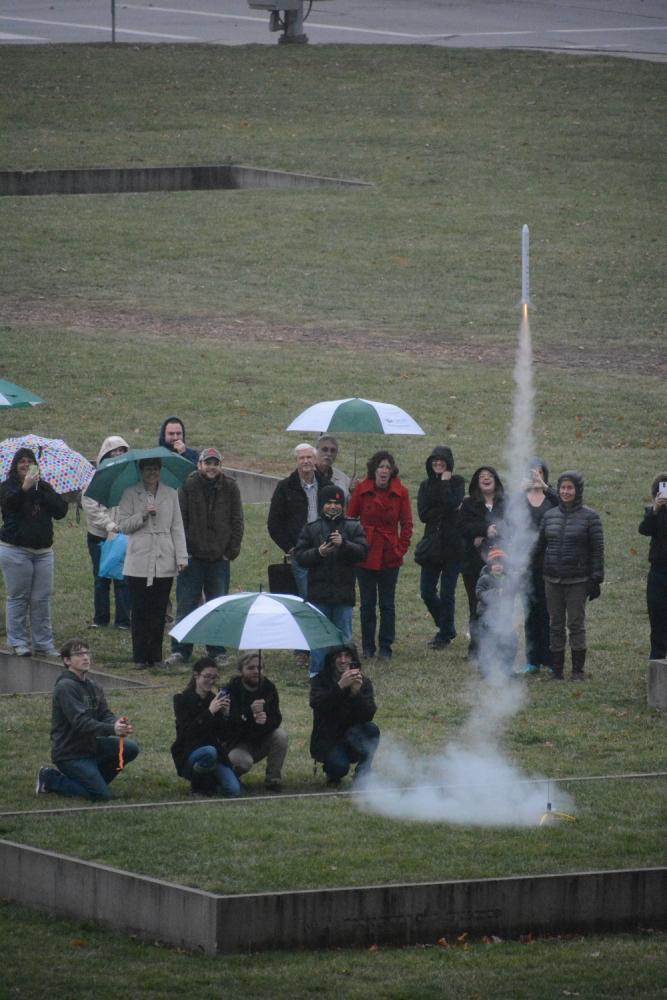 Colin Kruse is shown launching a model rocket