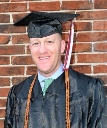 Nick Freisthler in his cap and gown