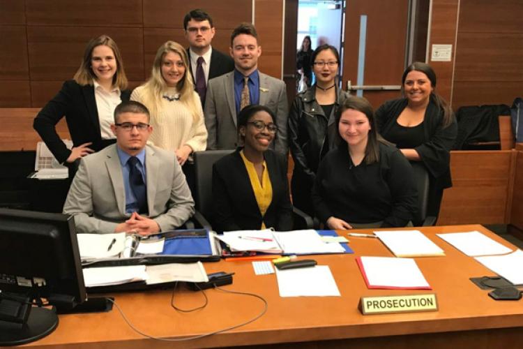 Members of the Mock Trial Team during competition in Columbus.