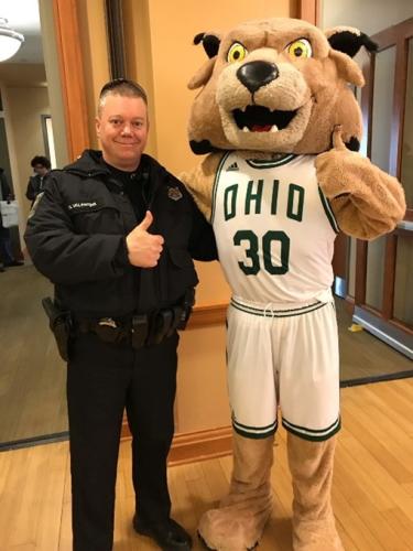 Officer Dave Valentine with Rufus