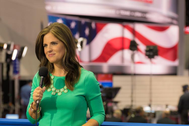 Autumn Ziemba reporting on stage