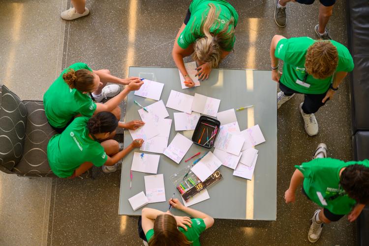 Medical Academy students write notes