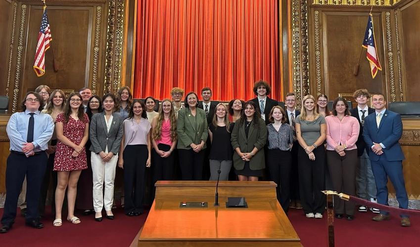 Participants in the Summer Law and Trial institute are shown in a courtroom with Jennifer Brunner