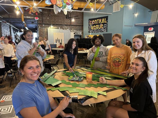 OHIO faculty and students help to build puppets at the Honey for the Heart Studio