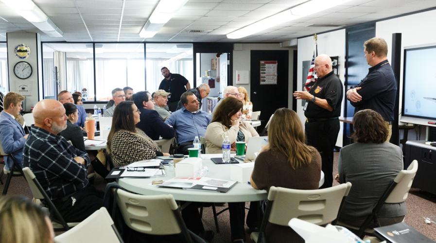 Members of the Mayors Partnership for Progress listen to a presentation